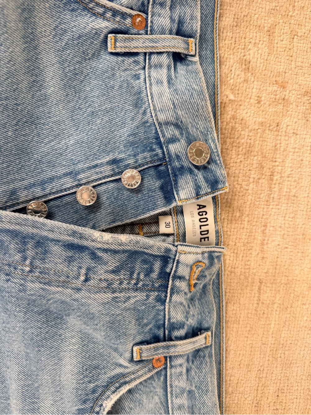 AGOLDE Parker blue denim shorts with a button fly